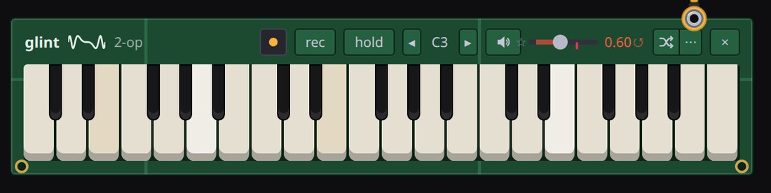 Glint’s keybed on the green board of a two-operator FM chip.