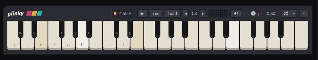 Plinky’s deck: the front of a toy keyboard chip on a battery.